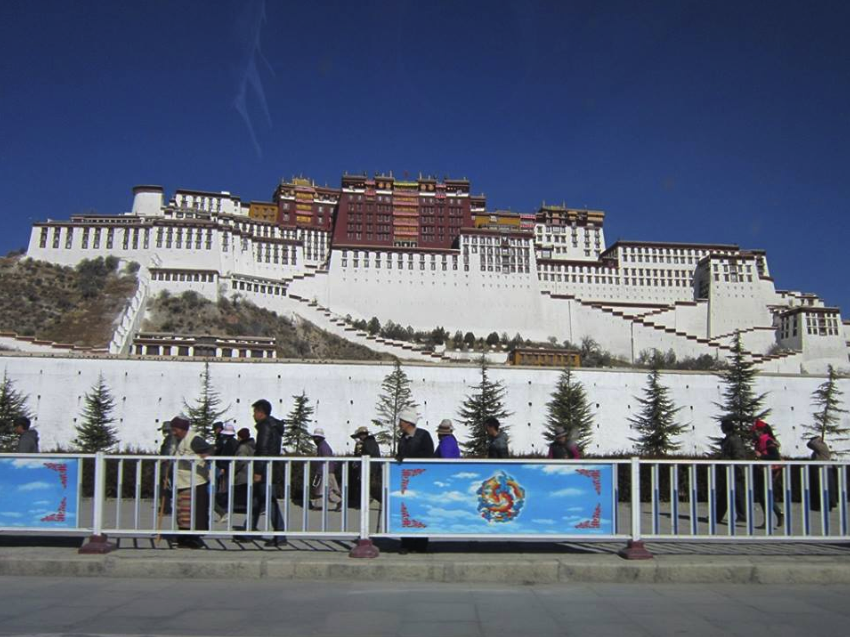 The Potala Palace. . In the foreground you can see pilgrims circling it as well.